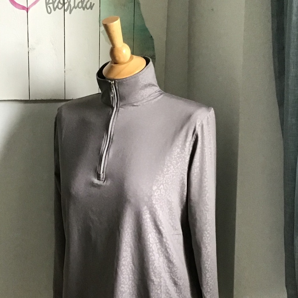 Gray three-quarter zip performance top
